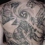 фото тату тигр и дракон 07.12.2018 №092 - tattoo tiger and dragon - tattoo-photo.ru